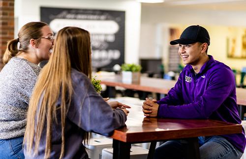 students having lunch at the marketplace on SBU campus